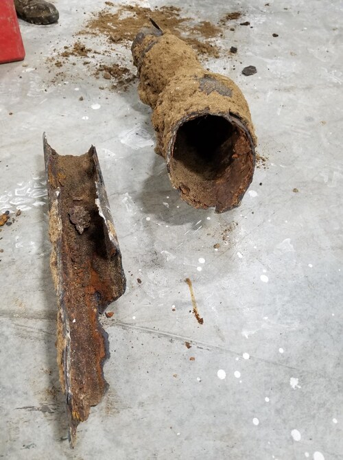 CME Pipe Lining - Collapsed Sewer Line image of collapsed sewer pipe.