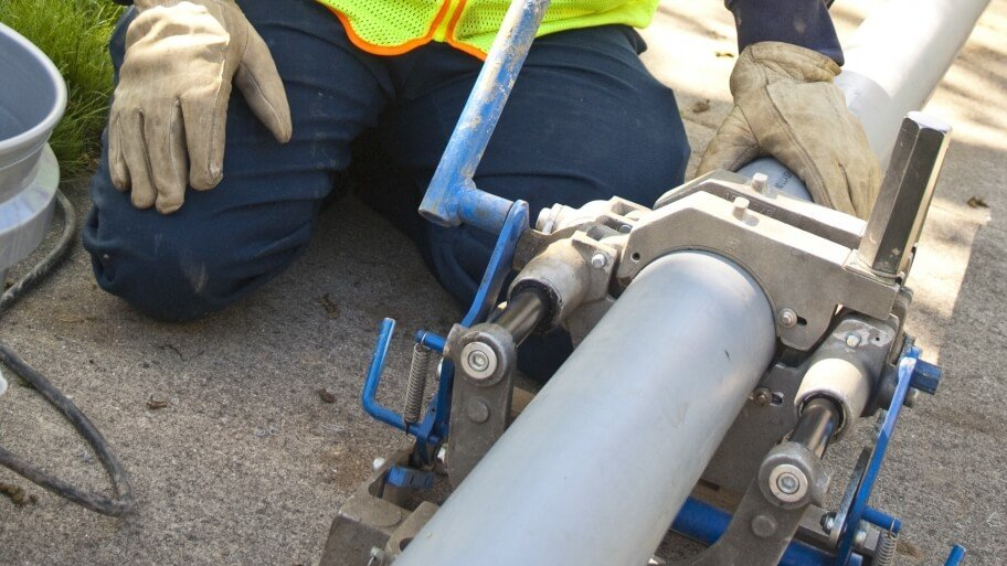 CME worker performing sewer repair.