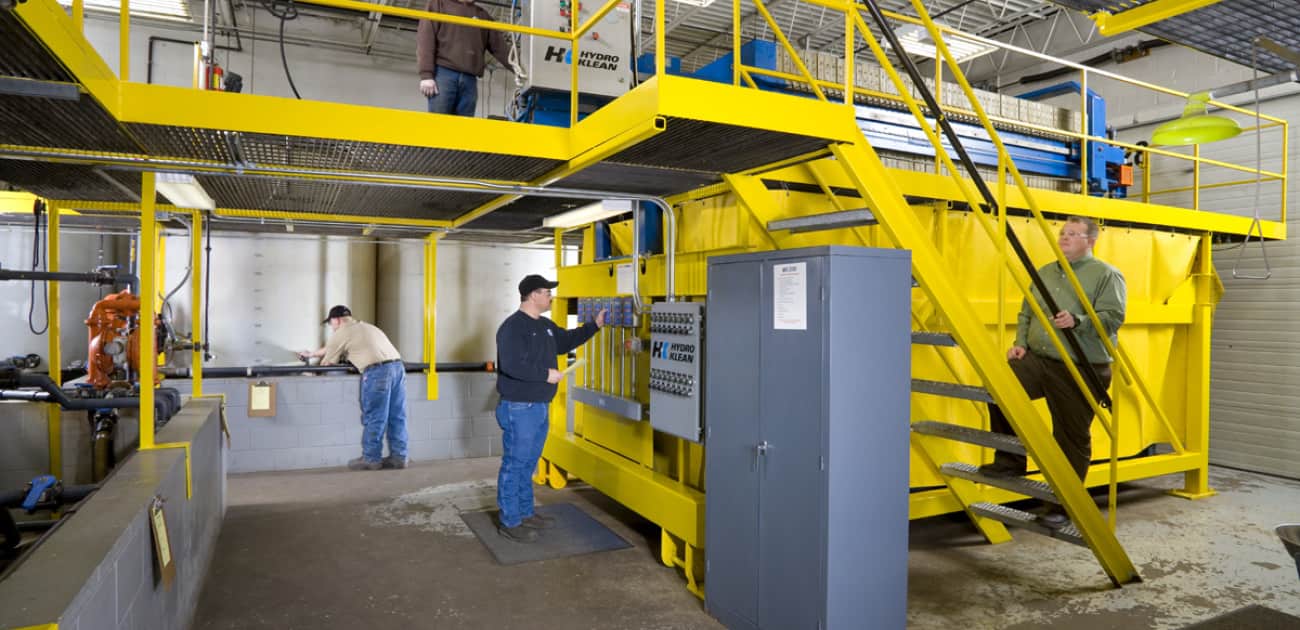 Workers at a waste treatment facility.