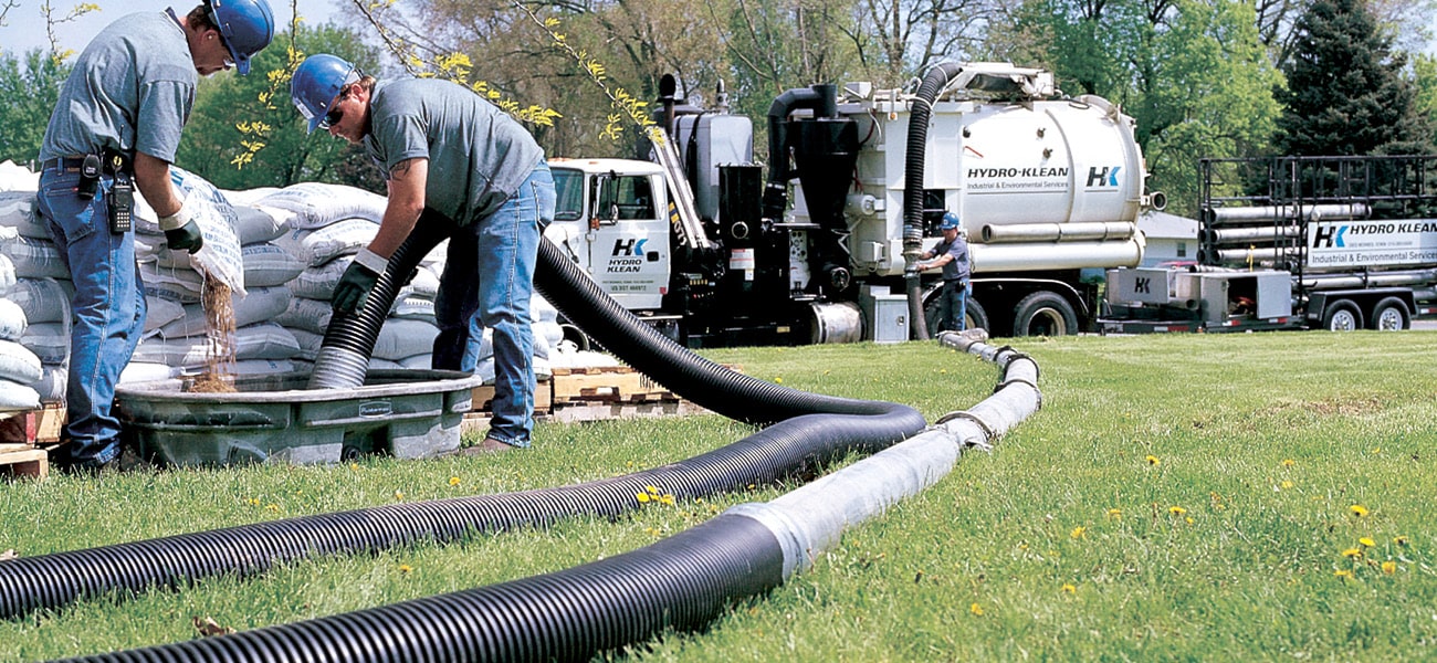 HK Vacuum Truck Services hk technicians performing industrial vacuum truck services.